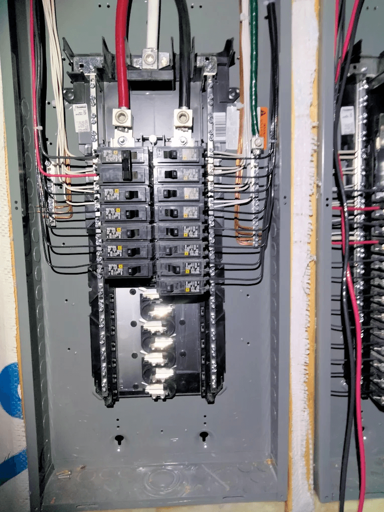 Neatly wired electrical breaker panel installed by High Desert Electric